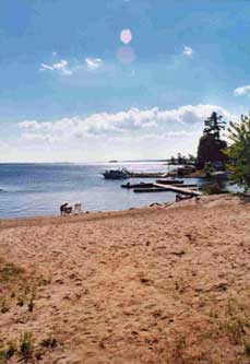 We drove north from Montreal (trying to stay on the right) past Ottawa and made it to a little place not far from Algonquin Park called Pembroke where we camped for the night by this beach.
